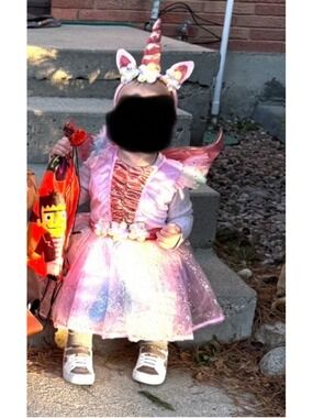Spirit Halloween Rosie unicorn sz 3/4 toddler. Includes dress wings tail head
